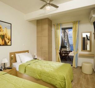 First floor single beds bedroom, direct access to the pool