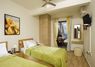First floor single beds bedroom, direct access to the pool