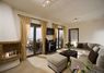 Living room with 32' flat TV with satellite programs, DVD & home cinema installation 